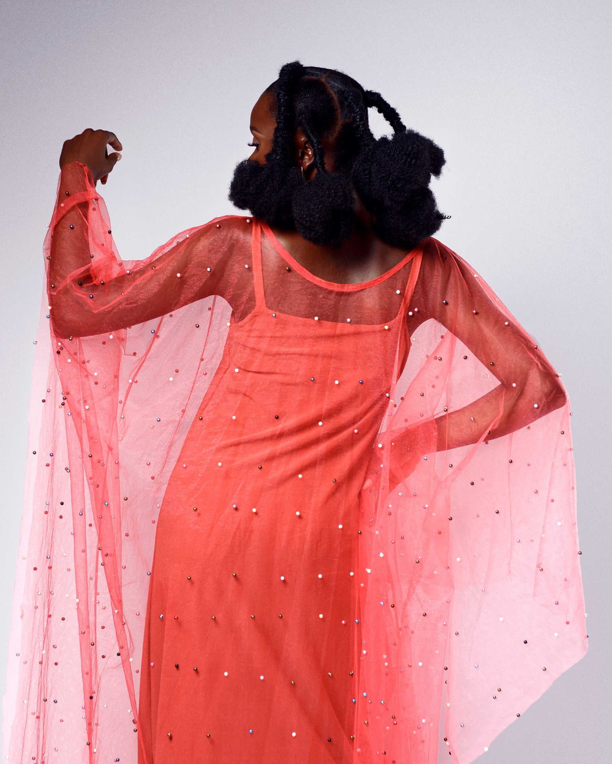 Discover the Odessa Pearl-Adorned Maxi Kaftan Dress, blending timeless sophistication with a modern African-inspired silhouette. Custom-made for all sizes.